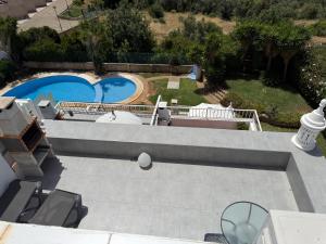 Seascape apartamento vista mar e piscina, terraço com BBQ