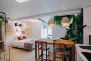 Suite Uluwatu - Spa, Cinéma & Ambiance tropicale