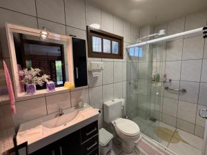 Casa em condomínio na Barra da Ibiraquera, na margem da lagoa
