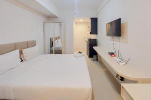 Scenic and Homey Studio Barsa City Apartment By Travelio