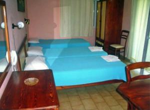 Studio (3 Adults) room in Paradise Studios