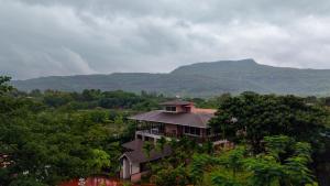 ELIVAAS Signature AARAA VILAS 4-BHK Luxury Pool Villa with Home Theatre, Sports Court & Panoramic Hill Views