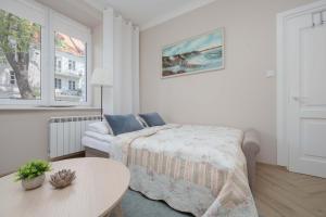 Przytulne Studio z Miejscem do Pracy Zdalnej by Noclegi Renters