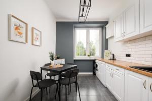 Tyszkiewicza Pleasant Apartment by BookingHost