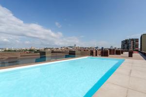 Luxury Living with Rooftop Pool and Garage by HostWise