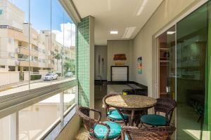 Apto. c churrasq. a 150m da praia MRS0001