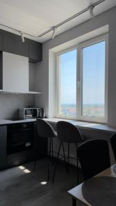 Sunset apartment with sea and sunrise views