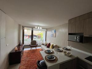Hermoso apartamento con vista al lago y volcanes
