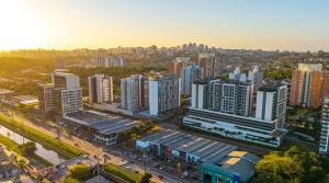 Studio completo, piscina e academia - 5 min da PUC