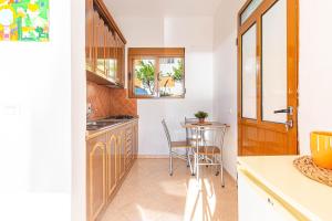 Radhima Sea View Studio Apt 10 - Kitchen, Parking & Balcony