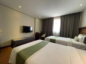 CLOVER HOTEL MONIVONG By LEE