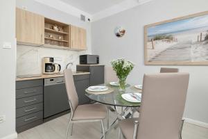 Komfortowy Apartament z Dostępem do Udogodnień w Kołobrzegu by Noclegi Renters