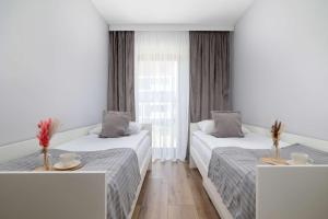 Przestronny Apartament z 2 sypialniami i Balkonem by Noclegi Renters