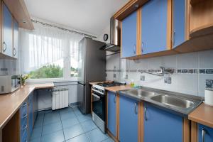 Odyńca Homely Apartment by BookingHost