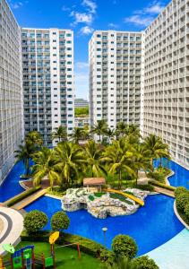 Stylish 1BR Pool View with Netflix Shore Near MOA