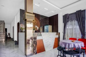 Hotel O near Masjid Raya Al-Mashun formerly Hotel Wisma Yuli