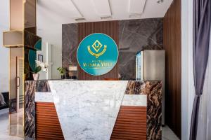 Hotel O near Masjid Raya Al-Mashun formerly Hotel Wisma Yuli