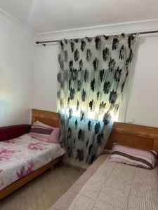 residential unit with a swimming pool and parking
