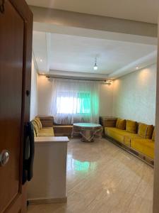 residential unit with a swimming pool and parking