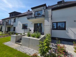 Calma - apartamenty z ogrodem blisko Energylandii