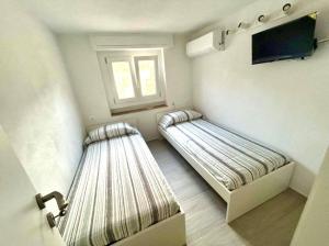 Appartamento Giglio - New apartment 500 meters from the sea with outdoor area