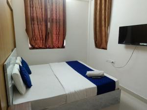 Luxury Rooms in Manikonda Near Knowledge City BY KP Suites Grand