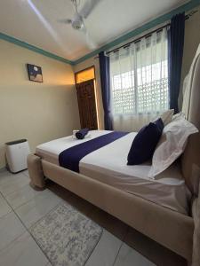 Relaxing 1BR with AC and free parking in Bamburi