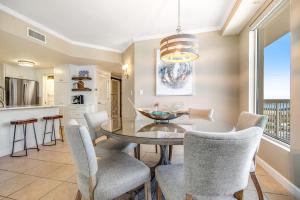High-rise beachfront elegance with wraparound balcony pools & gym