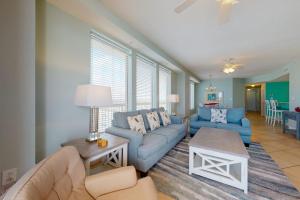 Sunny eighth-floor beachfront condo with pools hot tub & fitness room