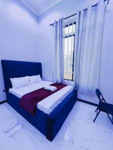 Cozy home by joyce,Room 1, 2mins walk to the Zanzibar airport
