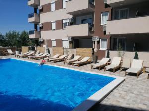 Kristi Lux NEW 1-bedroom apartment with Pool, Balcony and FREE Parking