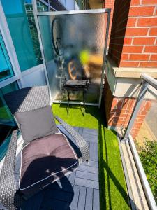 Downtown Loft style Condo with Pool Gym and Balcony