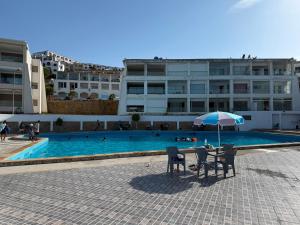 appartement dans un complexe résidentiel en face de la plage