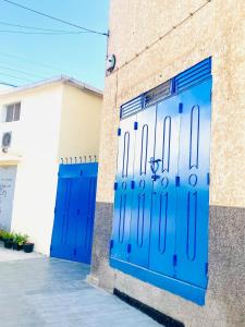Cosy appartement avec patio au centre ville, bien équipé, Fibre haut débit