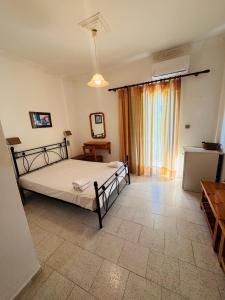 AMMOS Family Apartments & Rooms