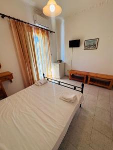 AMMOS Family Apartments & Rooms