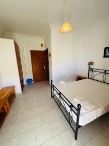 AMMOS Family Apartments & Rooms