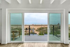 Beachfront Condo on A LowKey Beach