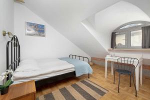 Two-Level Apartment in the City Center with Air Conditioning by Noclegi Renters