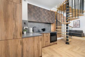 Two-Level Apartment in the City Center with Air Conditioning by Noclegi Renters
