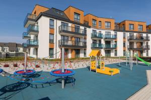 Bel Mare Modern Apartment with Terrace Close to the Beach by Noclegi Renters