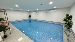 Al Hawli pool gathering