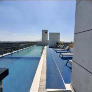 Beautifully furnished apartment with swimming pool ample parking space fully equipped gym child play area and amazing city views