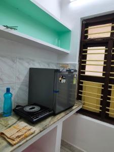 Calm 2 BHK GF with Garden Access in main town - SAGE