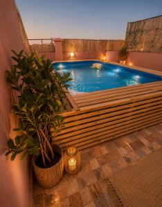 Khyli rooftop 1 vue palmerie