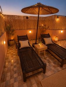 Khyli rooftop 1 vue palmerie