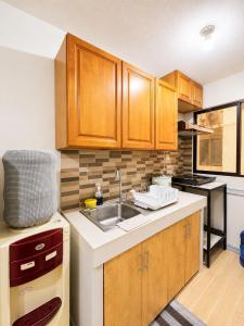 Cozy 2BR Condo Near Sm Ecoland Free WIFI
