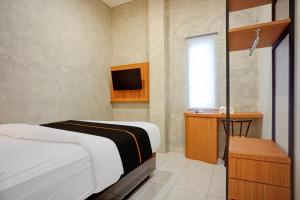 Hotel O near Universitas Sumatera Utara formerly Aljadid Guest House Pajus