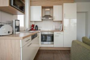 Strandpark-Grossenbrode-Haus-Kuestenzauber-Wohnung-15-KAePTNs-KAJUeTE