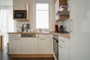 Strandpark-Grossenbrode-Haus-Kuestenzauber-Wohnung-15-KAePTNs-KAJUeTE